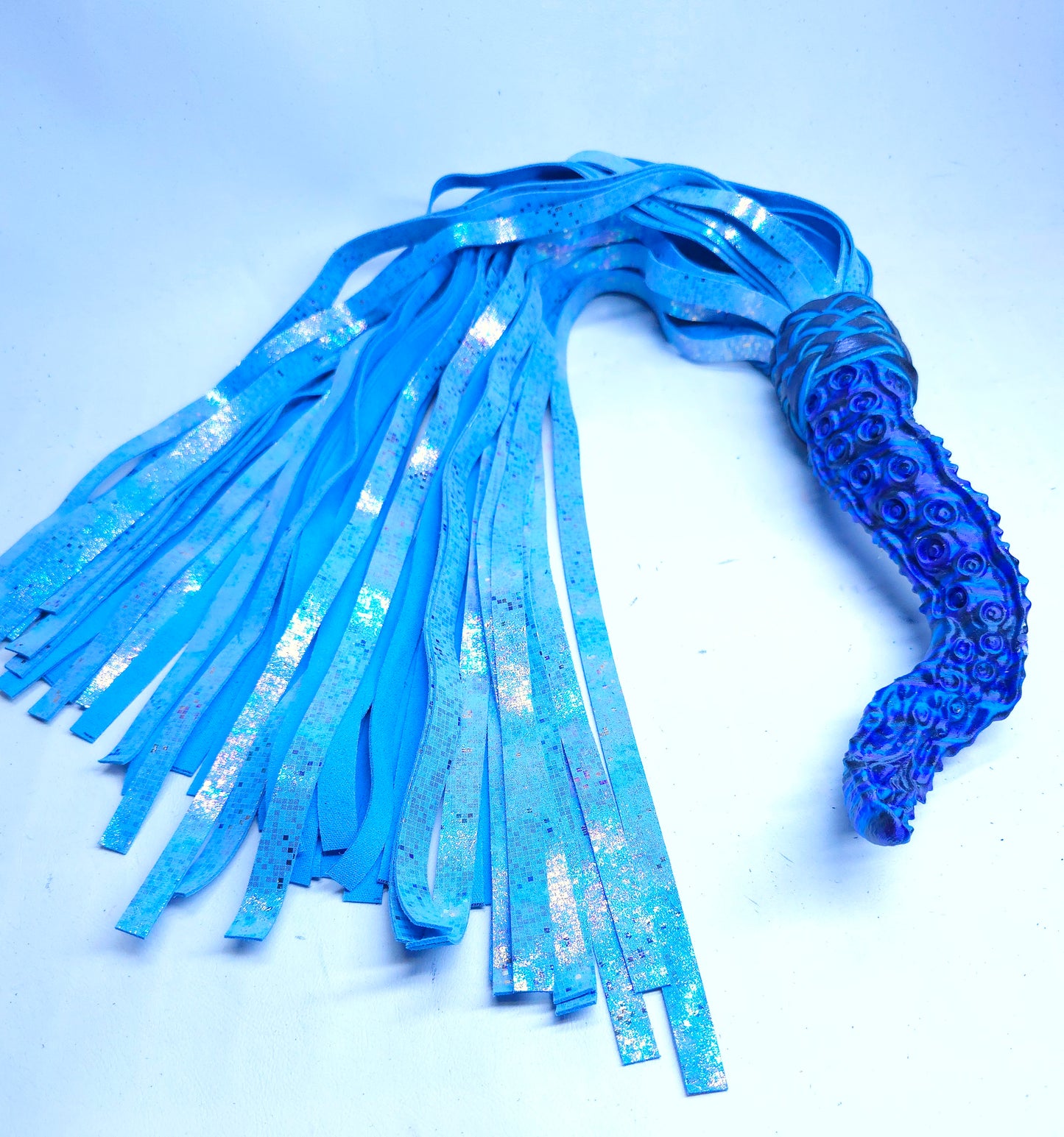 Blue Tentacle Handle flogger with iridescent blue leather
