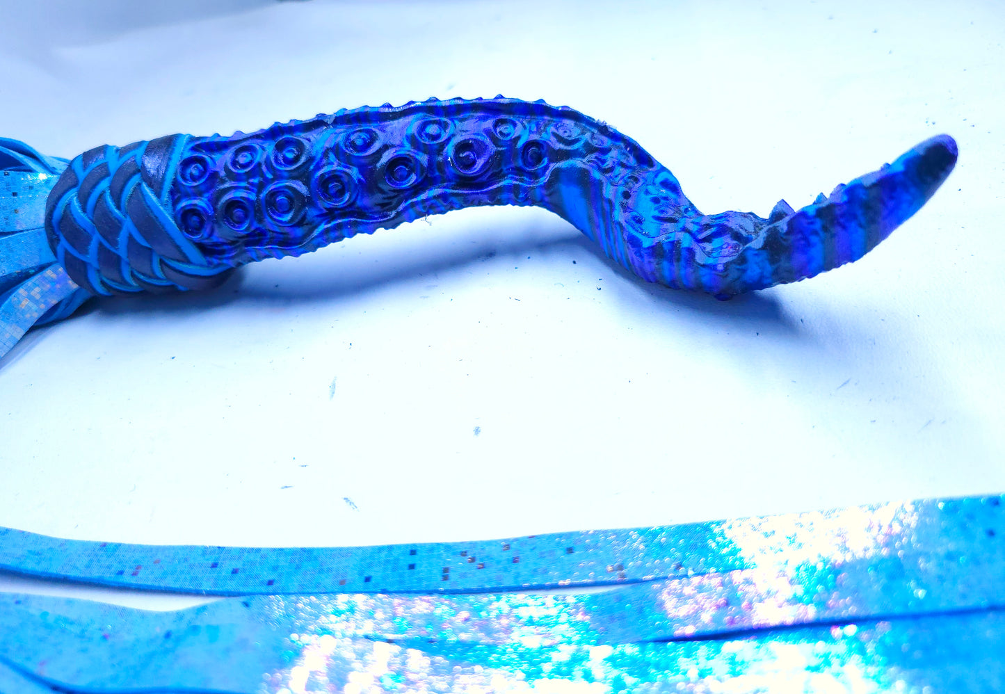 Blue Tentacle Handle flogger with iridescent blue leather