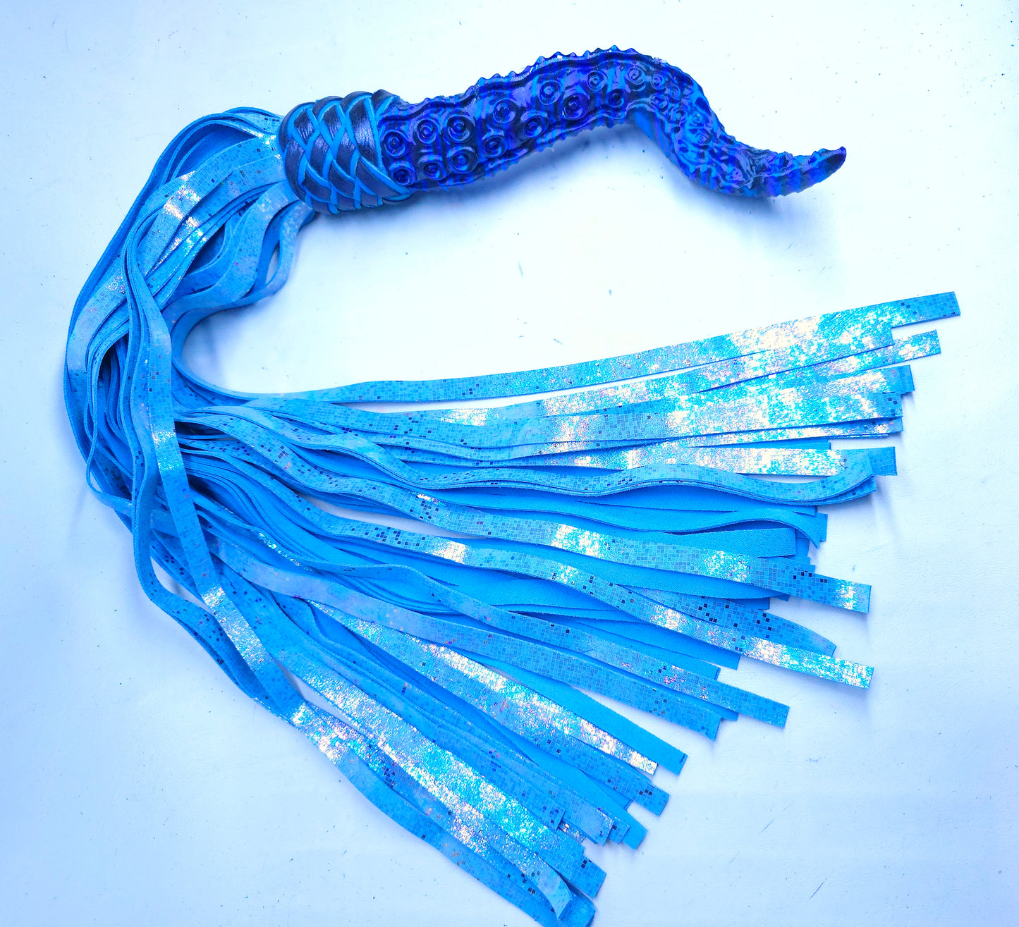 Blue Tentacle Handle flogger with iridescent blue leather