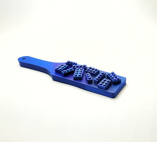 Blue spanking paddle with blocks