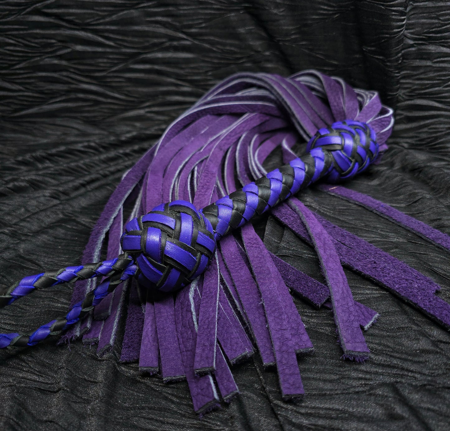 Handmade purple flogger by firebird leather