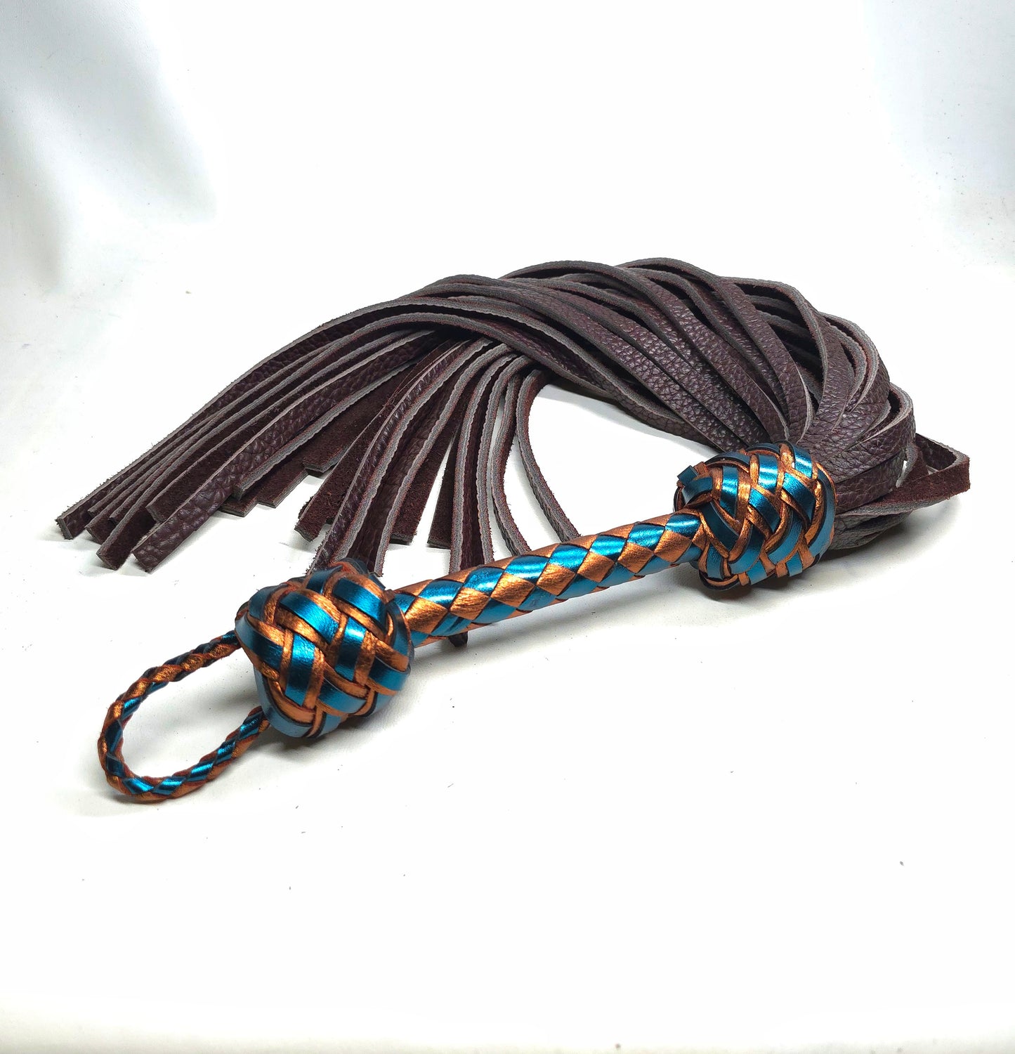 brown and green bison leather flogger