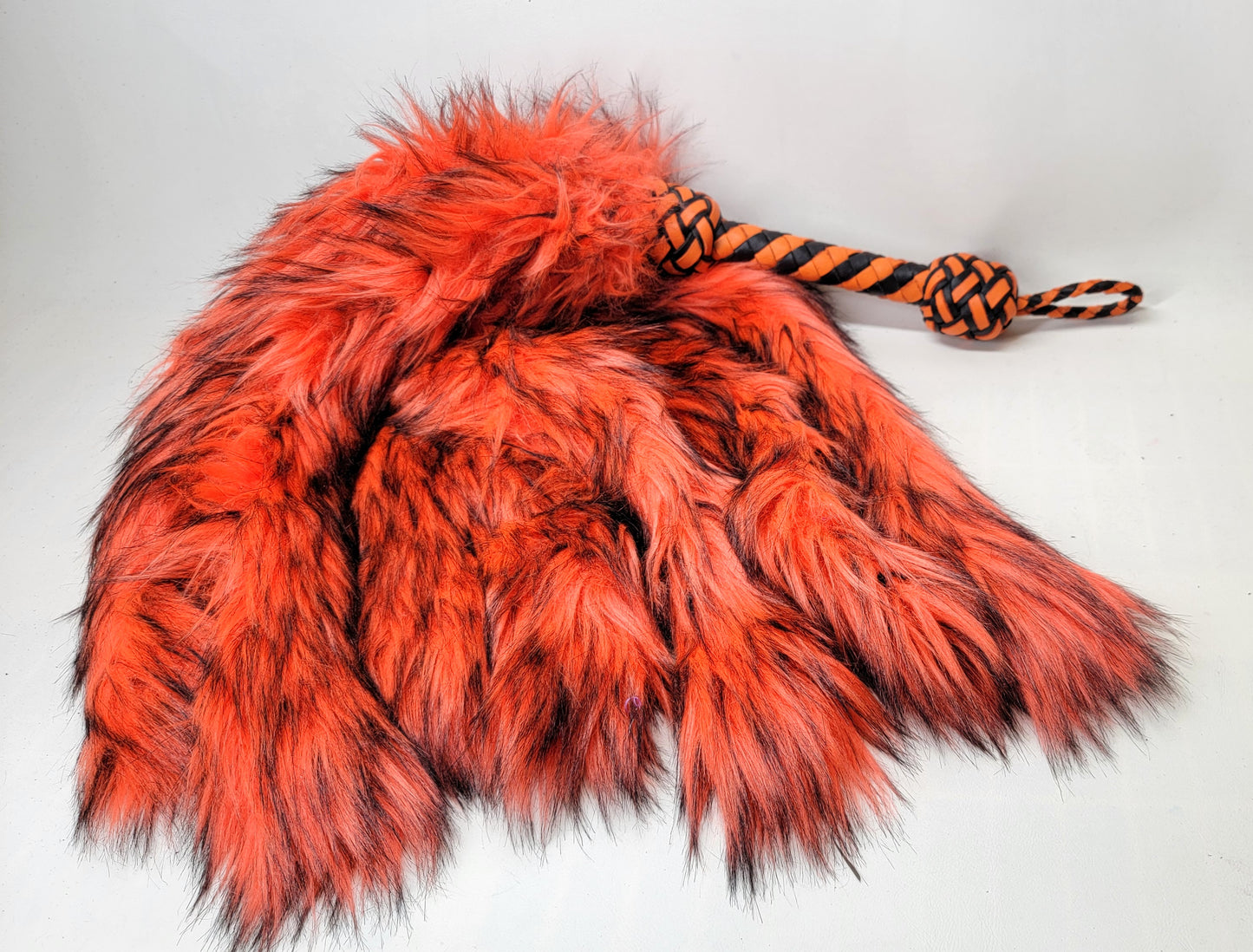 Orange Weighted fur flogger for bdsm