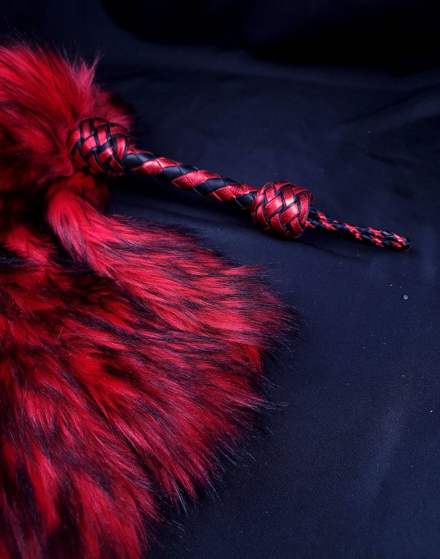 Flogger with weighted faux fur tails in red